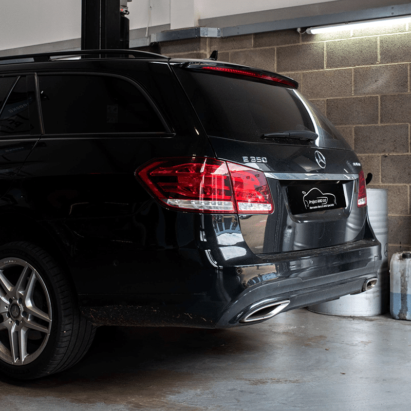 black mercedes with plate