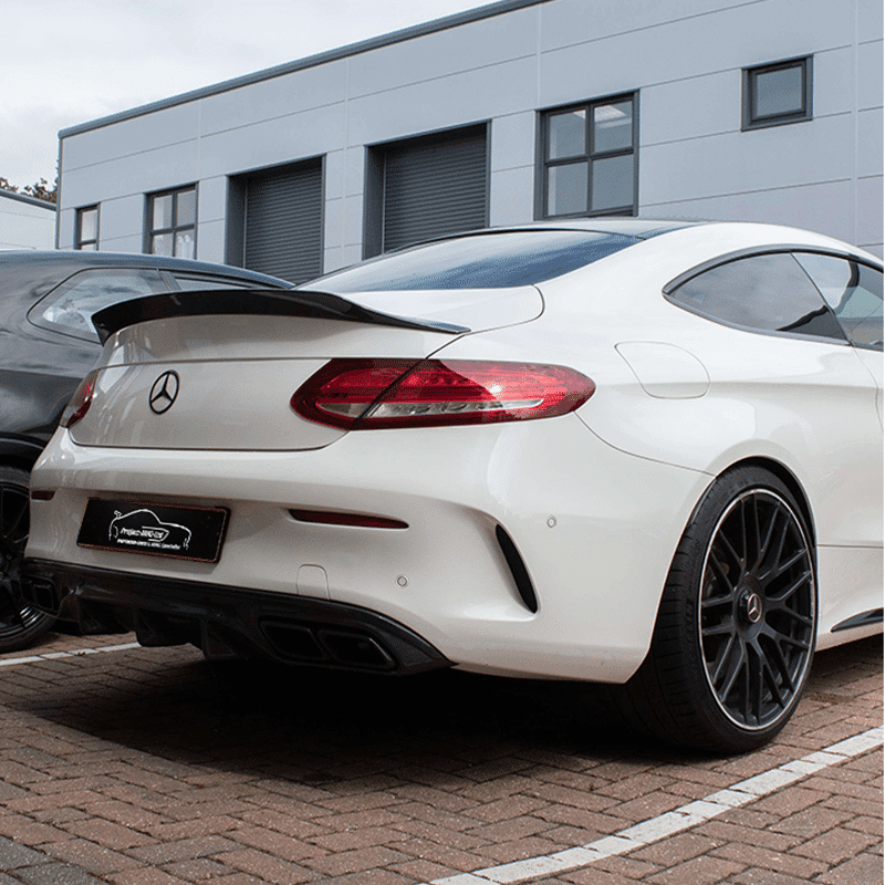 white mercedes backshot